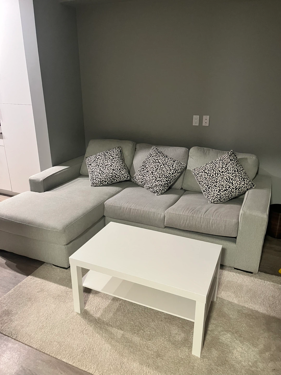 Light Grey Sectional Sofa with Pillows
