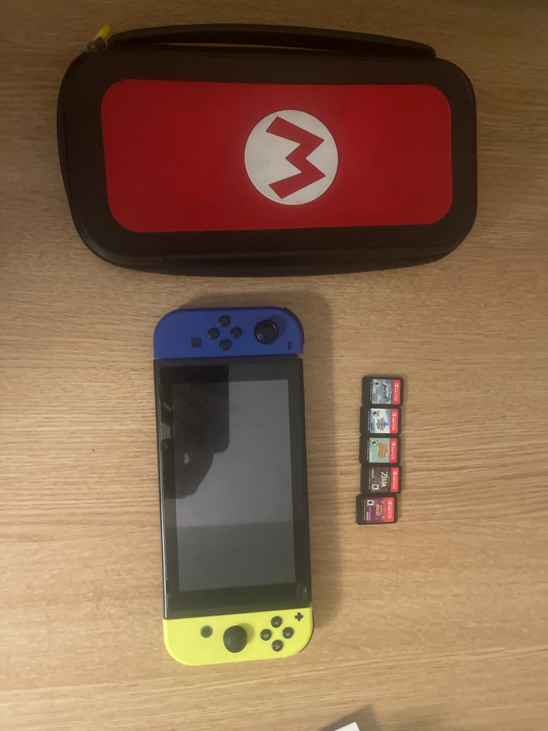 Nintendo Switch with Games and Case open to good offers