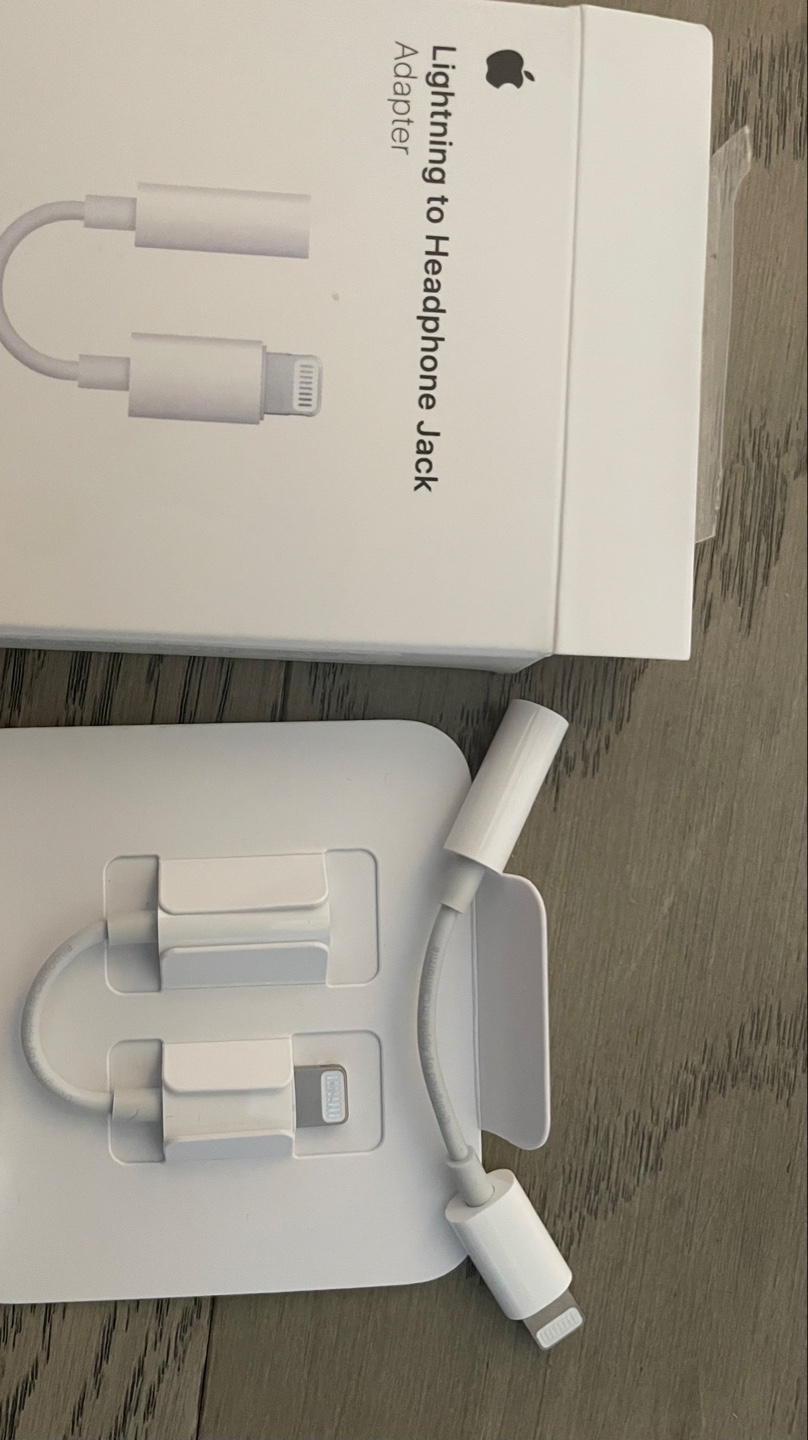 One left- Apple Lightning to Headphone Jack Adapter - New
