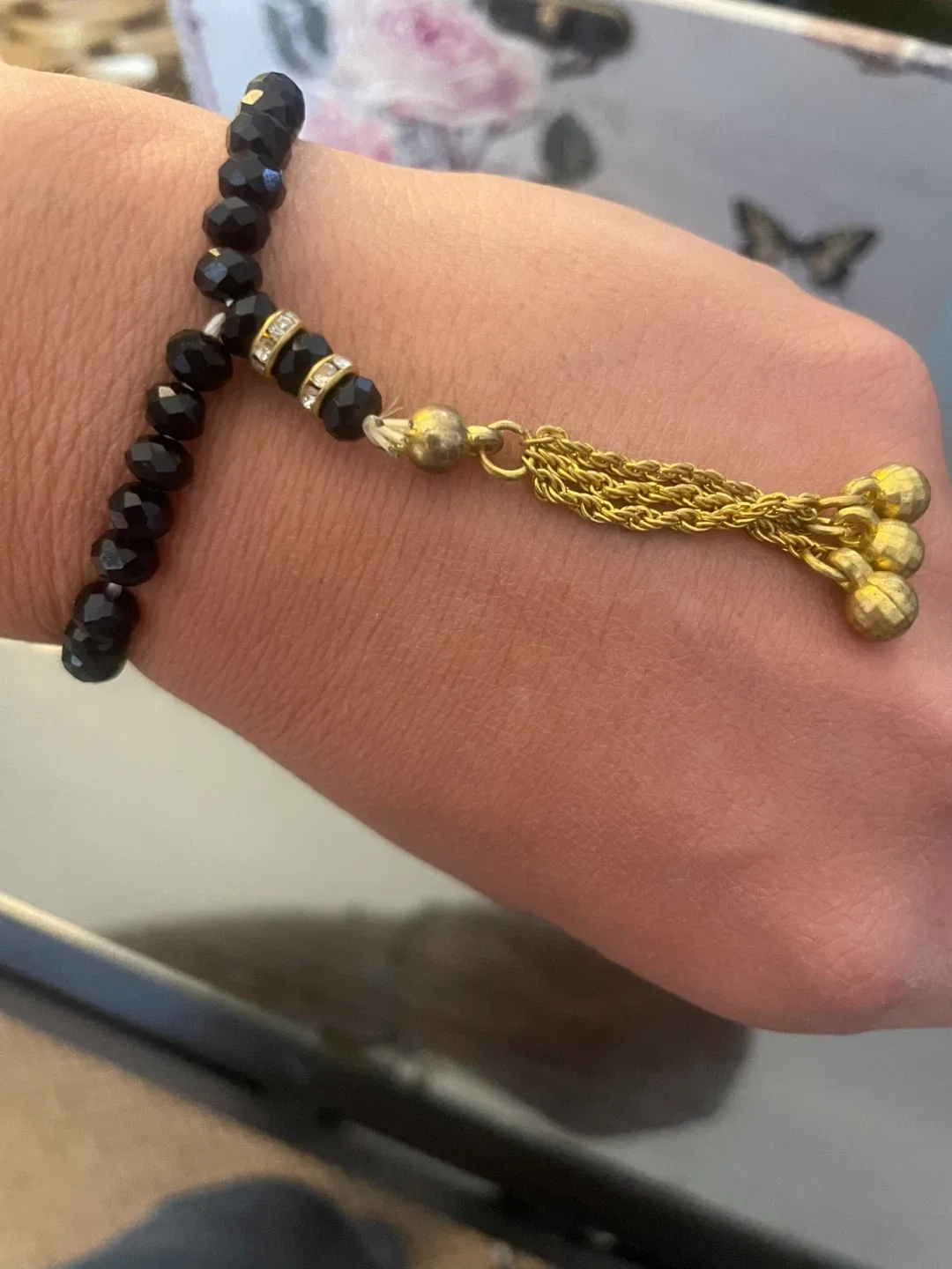 Black Beaded Bracelet with Gold Tassels image indicator(3)
