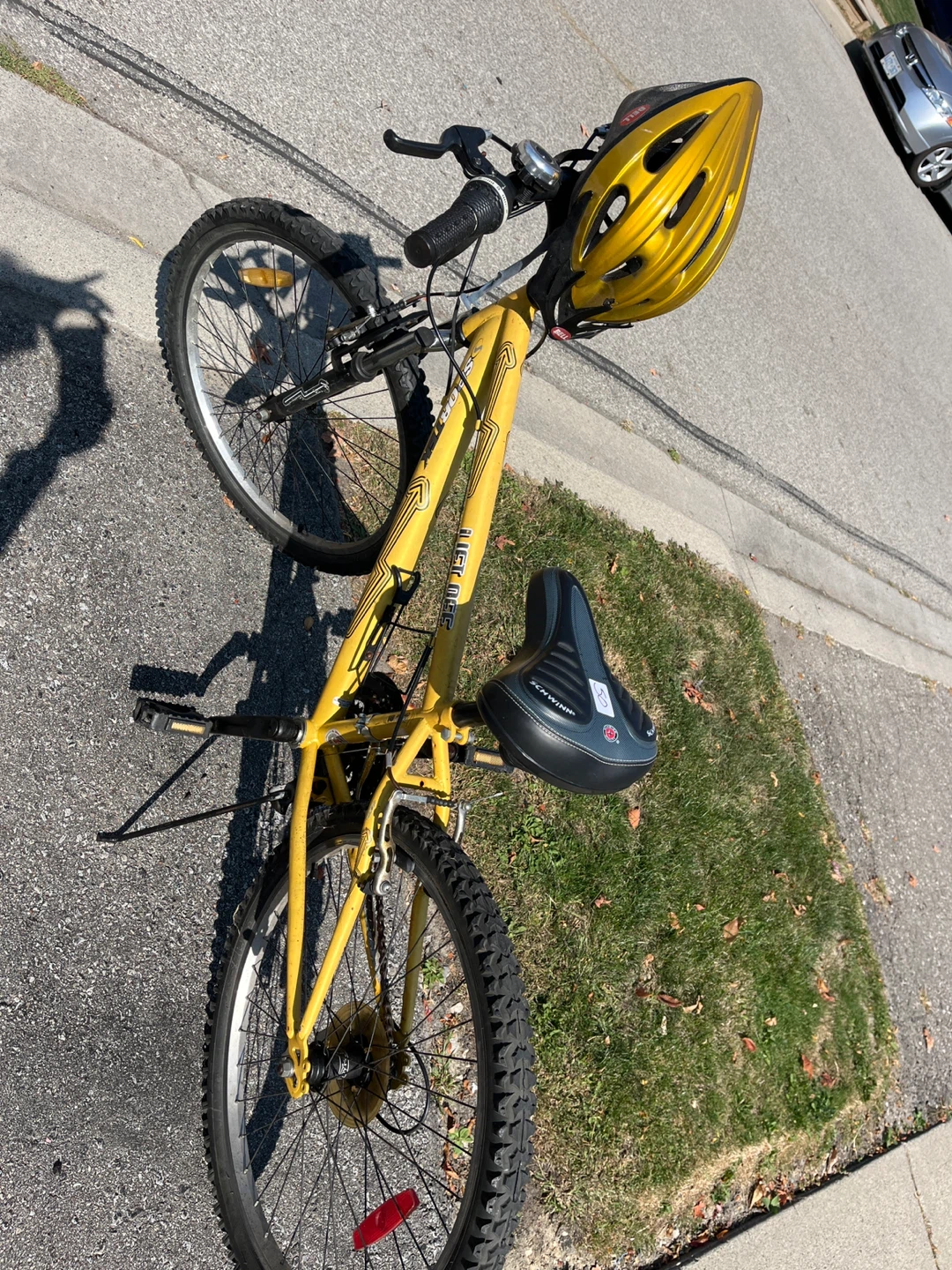 Yellow GT Off Road Bike with Bell Helmet
