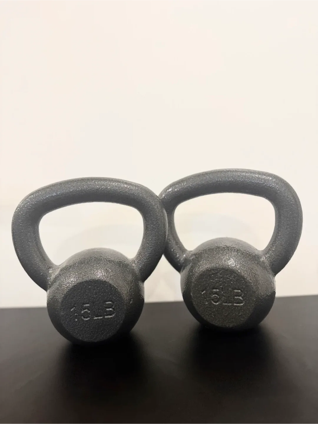 Two 15 lb Cast Iron Kettlebells