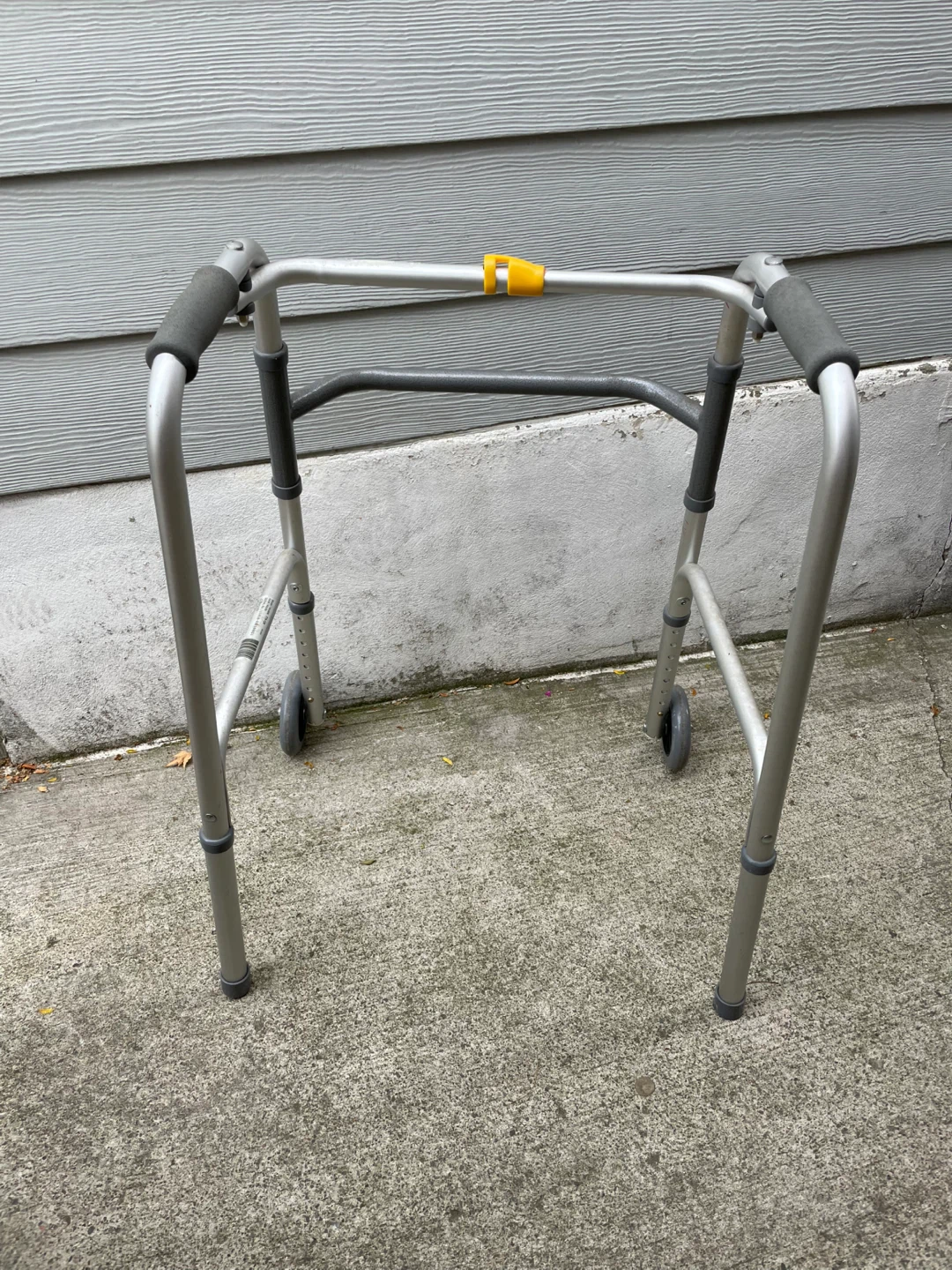 Airgo one button folding adjustable wheeled walker