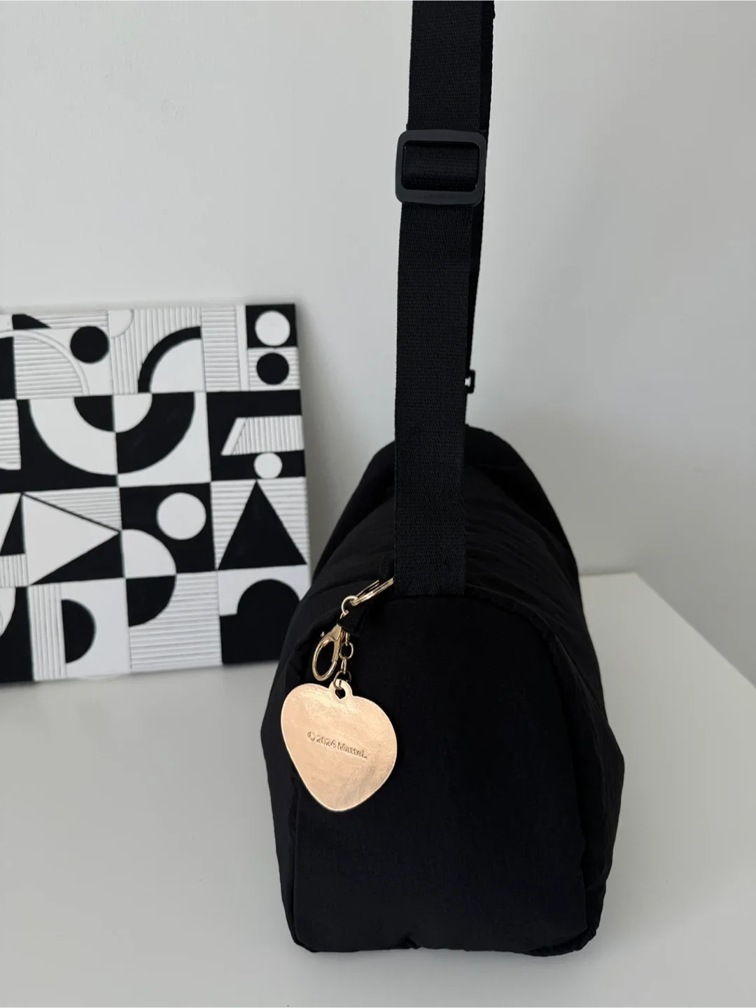 Black Shoulder Bag with a nice Barbie keychain image indicator(5)