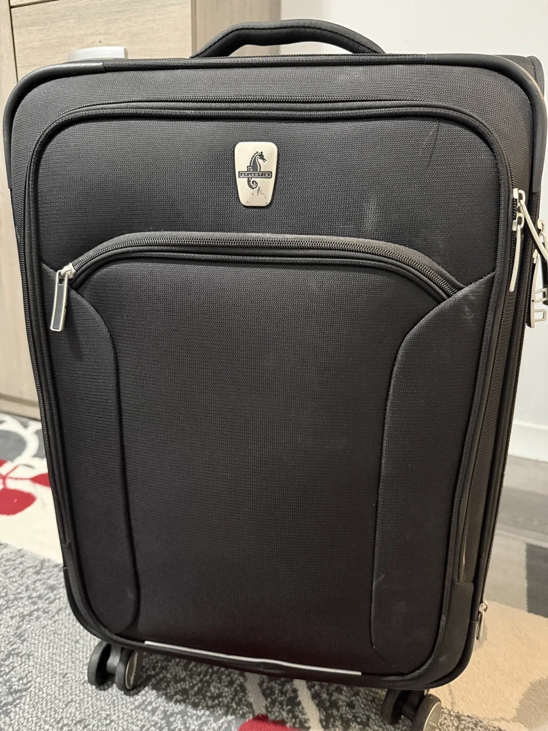 Heys Black Rolling Suitcase