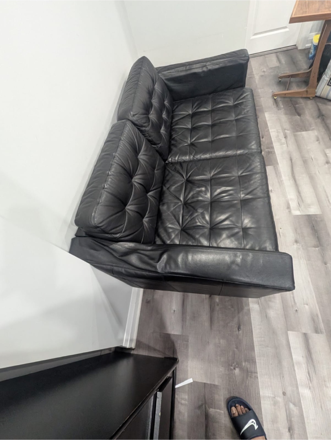 Black Leather Sofa with glass table