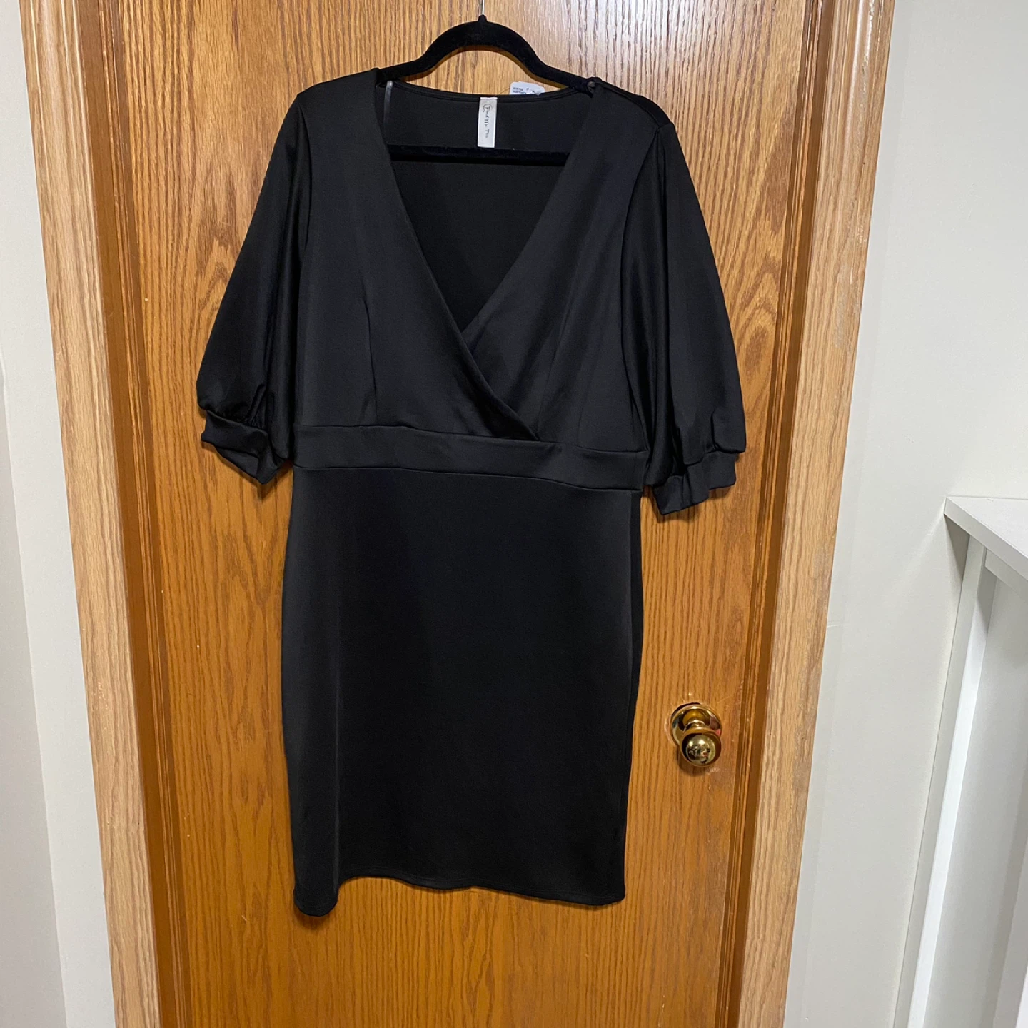 Plus size black knit dress