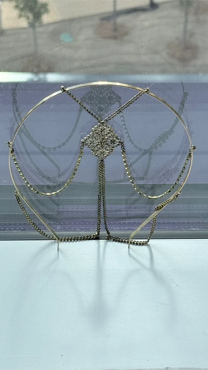 Gold tone headpiece with chain detail thumbnail