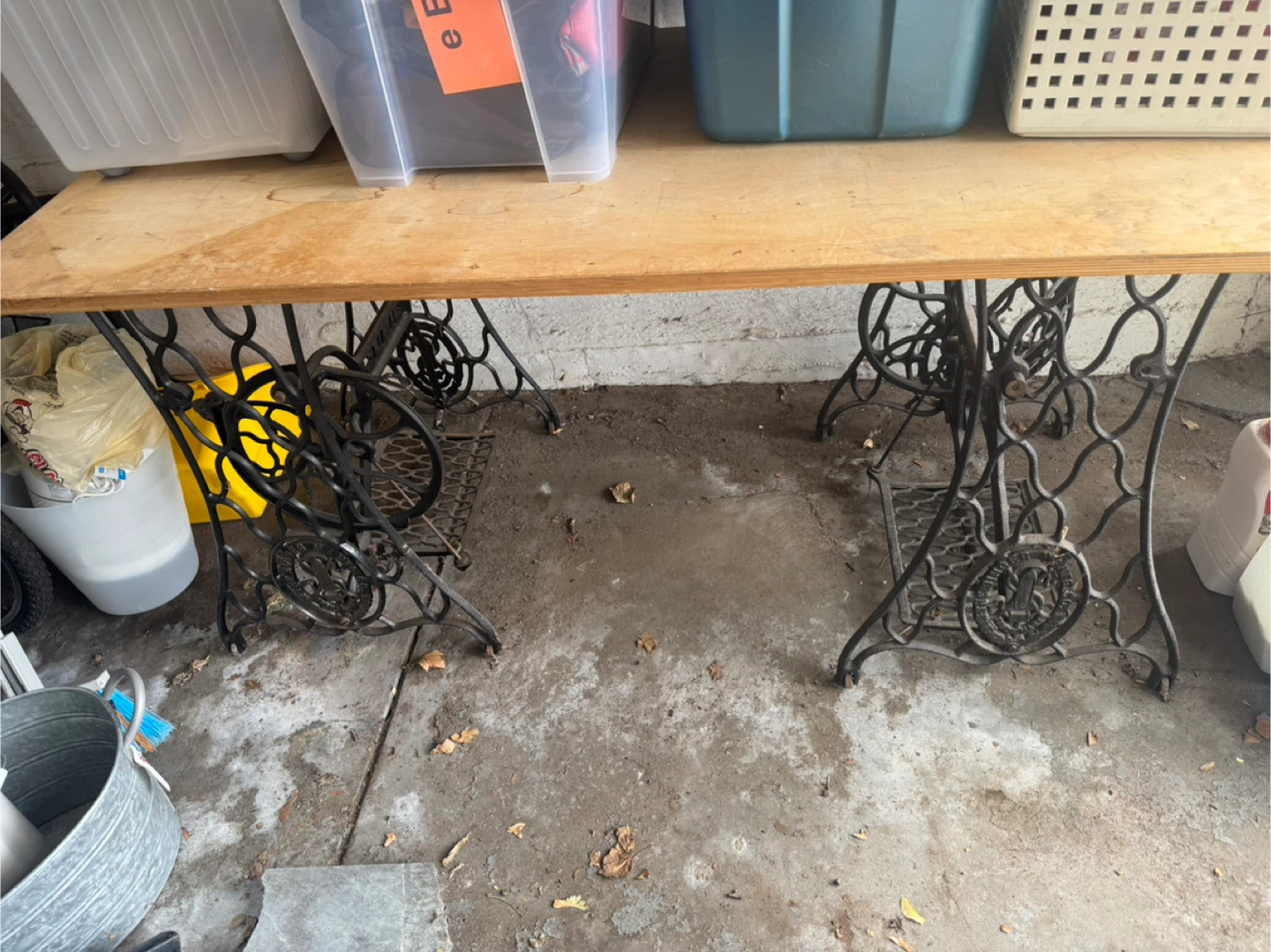Table with two vintage Singer Sewing Machine Tables as legs