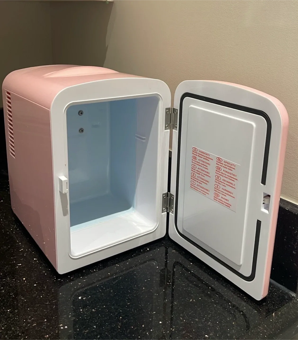 Below Retail Chefman Portable Personal Pink Mini Fridge image indicator(2)
