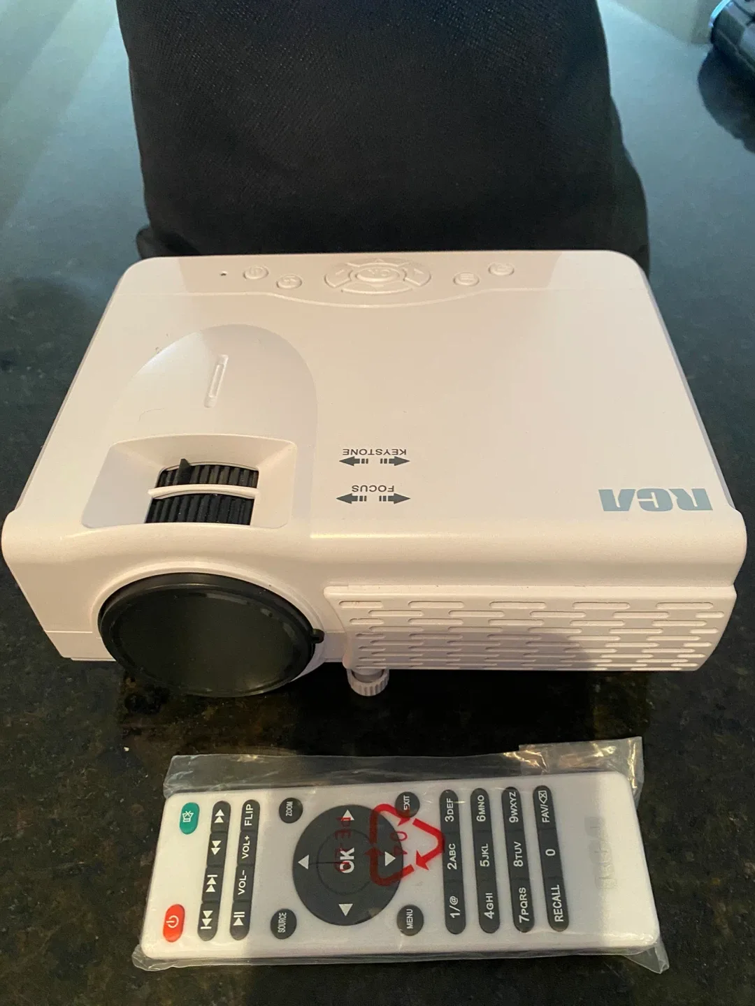 RCA Projector with Remote and screen thumbnail