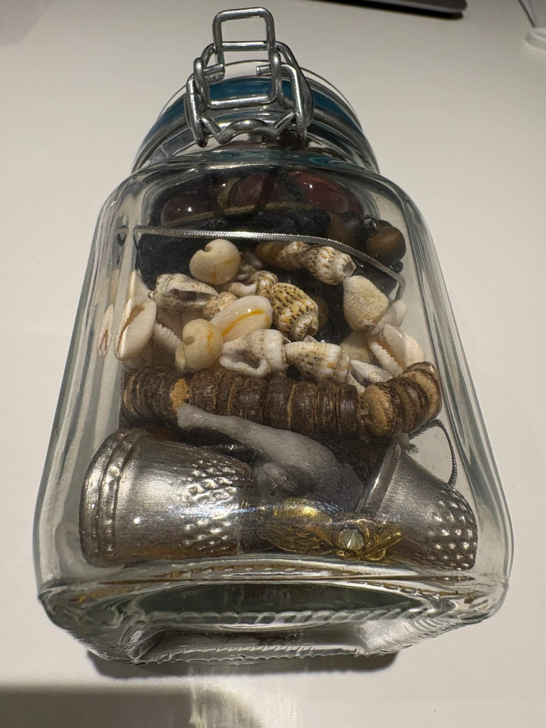 4 bracelets and a jar of mixed pendants and necklaces - photo 5