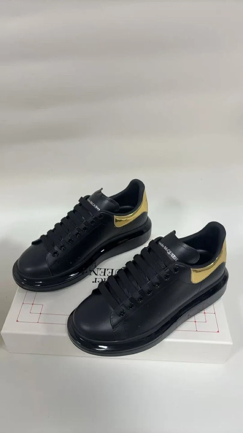 Alexander McQueen Black & Gold Sneakers thumbnail