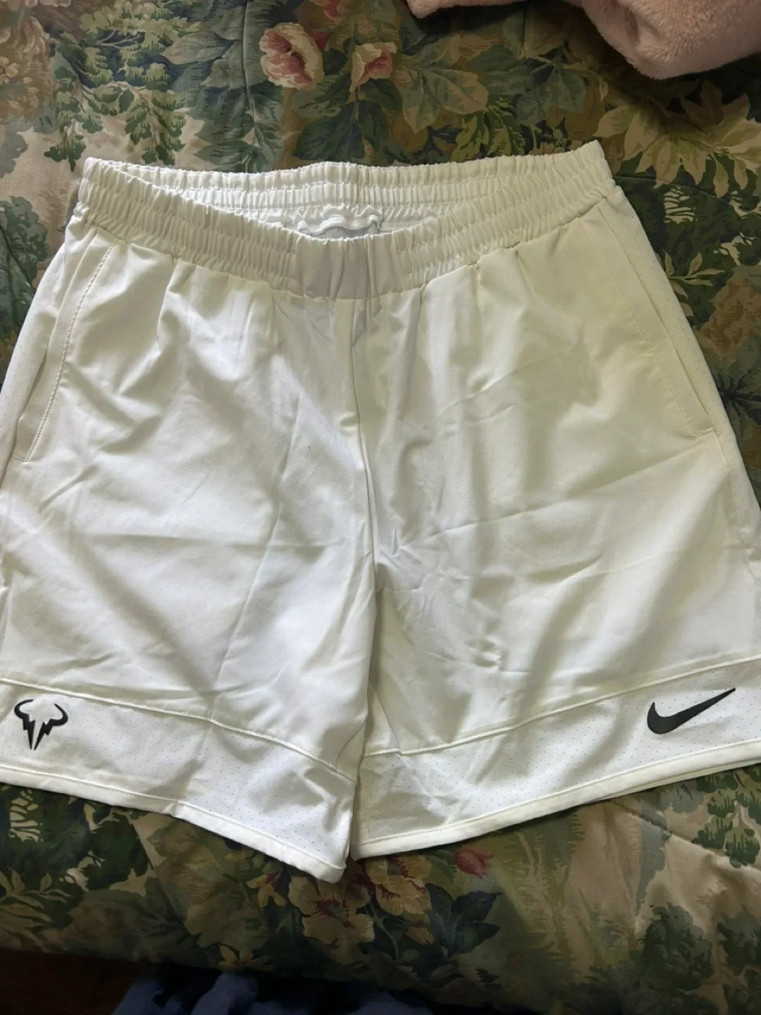 ASICS tennis top and Nike Rafa shorts. Men’s medium image indicator(3)