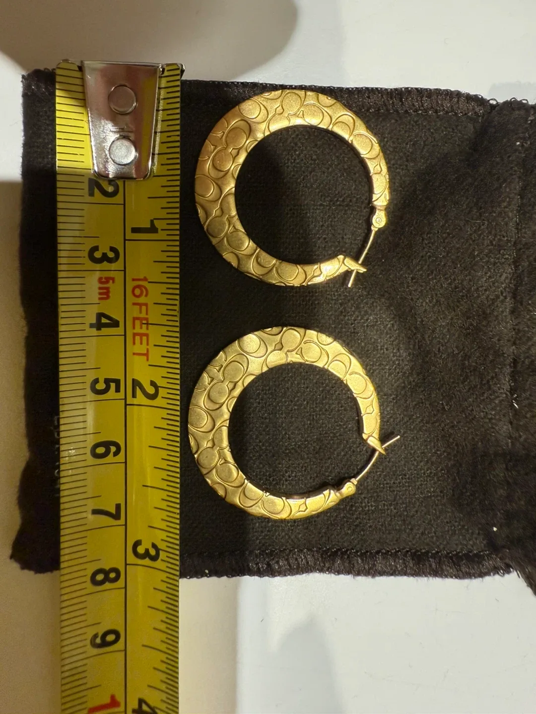 Coach gold-tone earrings image indicator(5)