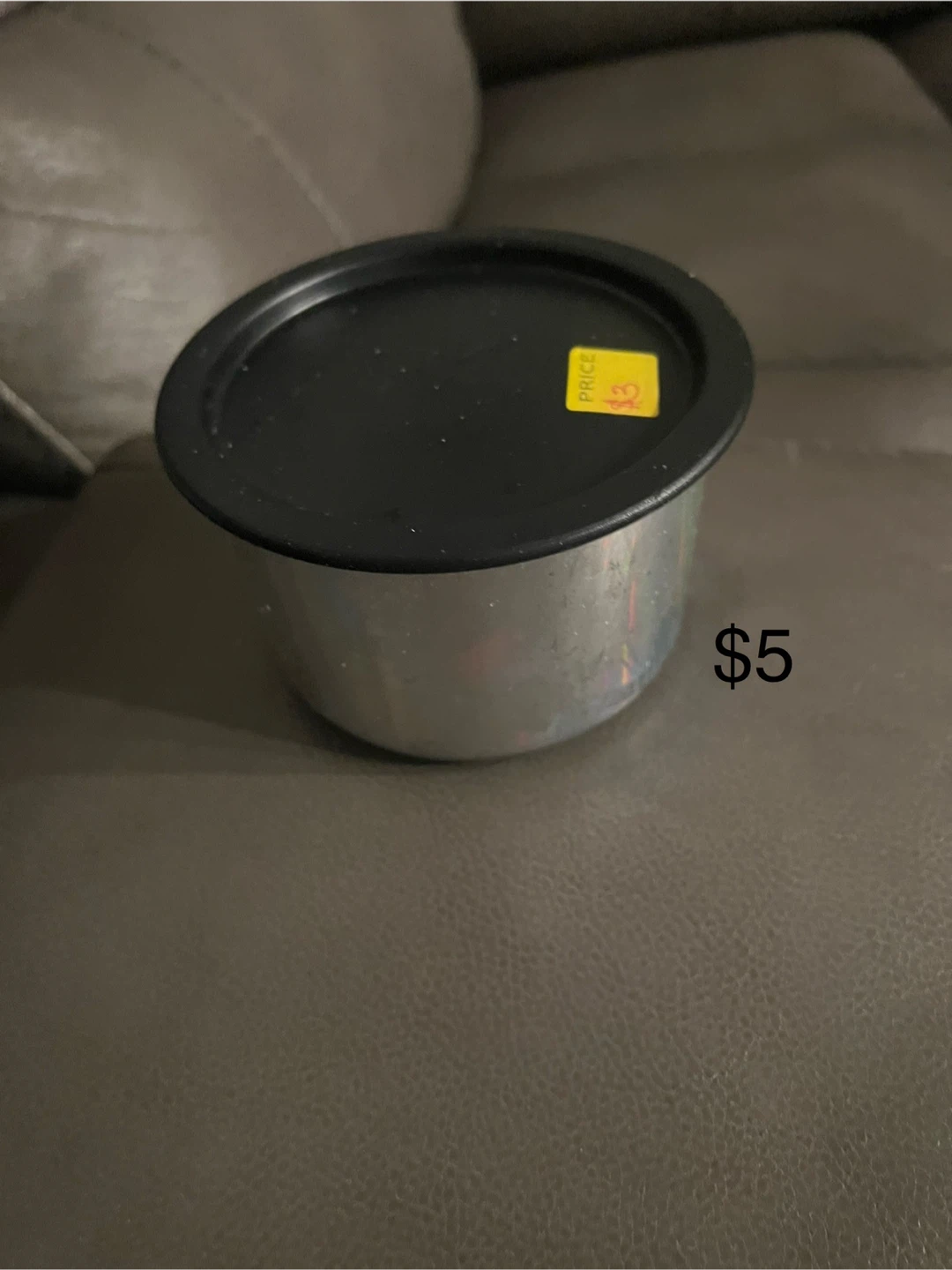 Gray Tupperware container with Black Lid
