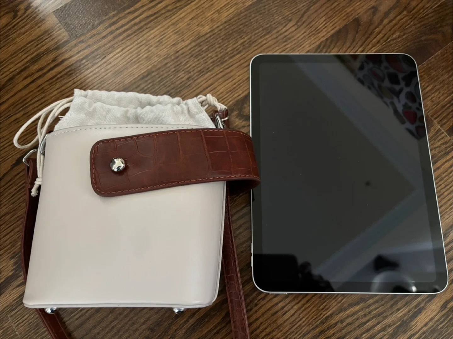 Beige Bucket Crossbody Bag with Croc Accents image indicator(2)