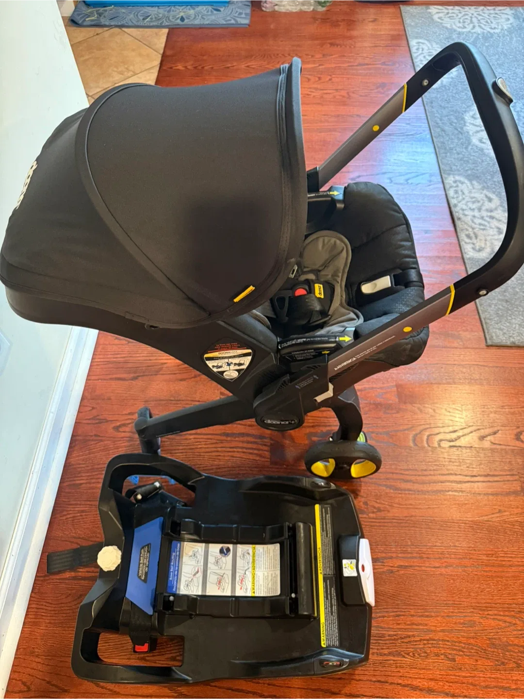 Doona Infant Car Seat Stroller with Base & Accessories image indicator(6)