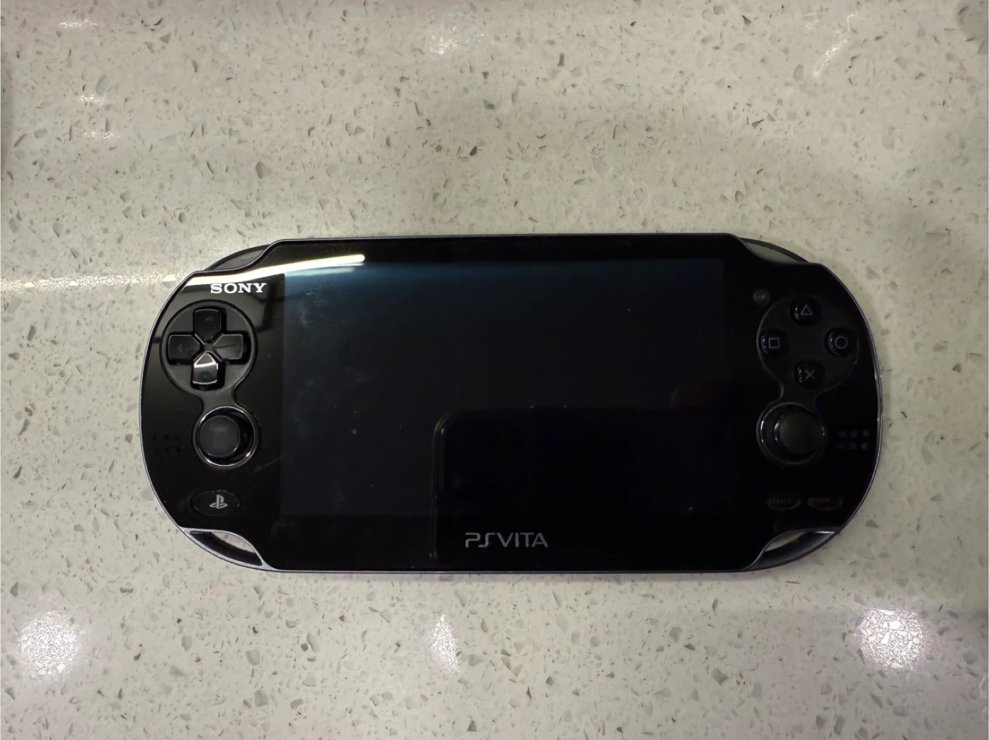 Sony PlayStation Vita + Case