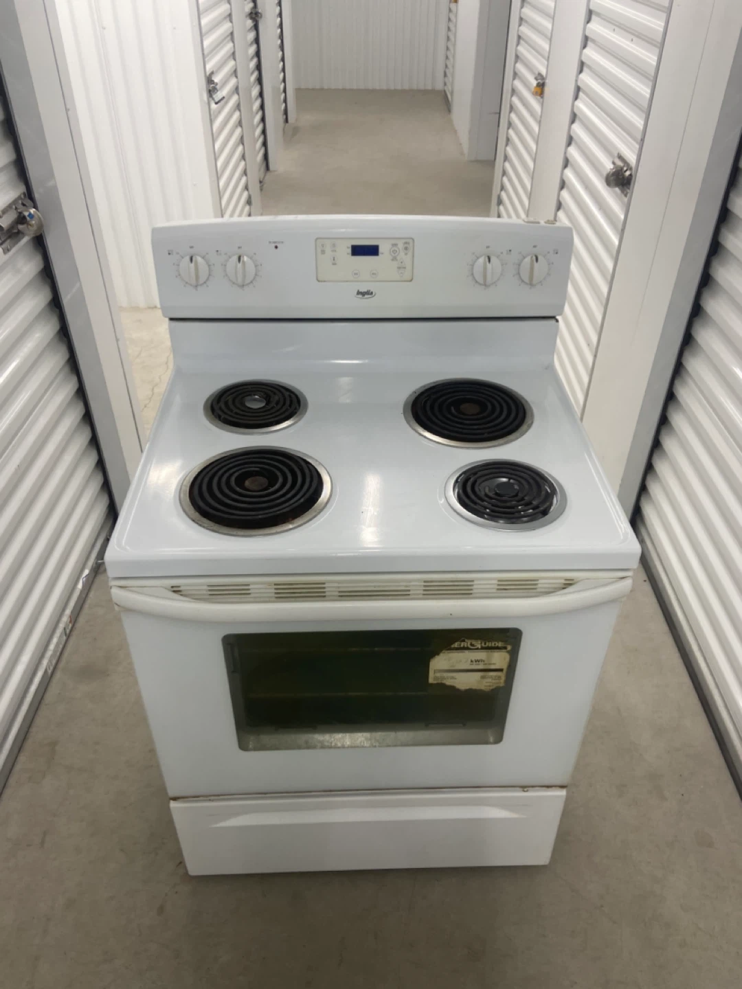 SLIGHTLY USED WHITE COIL STOVE