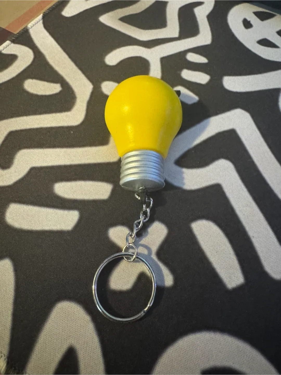Yellow Light Bulb Measuring Tape Keychain thumbnail