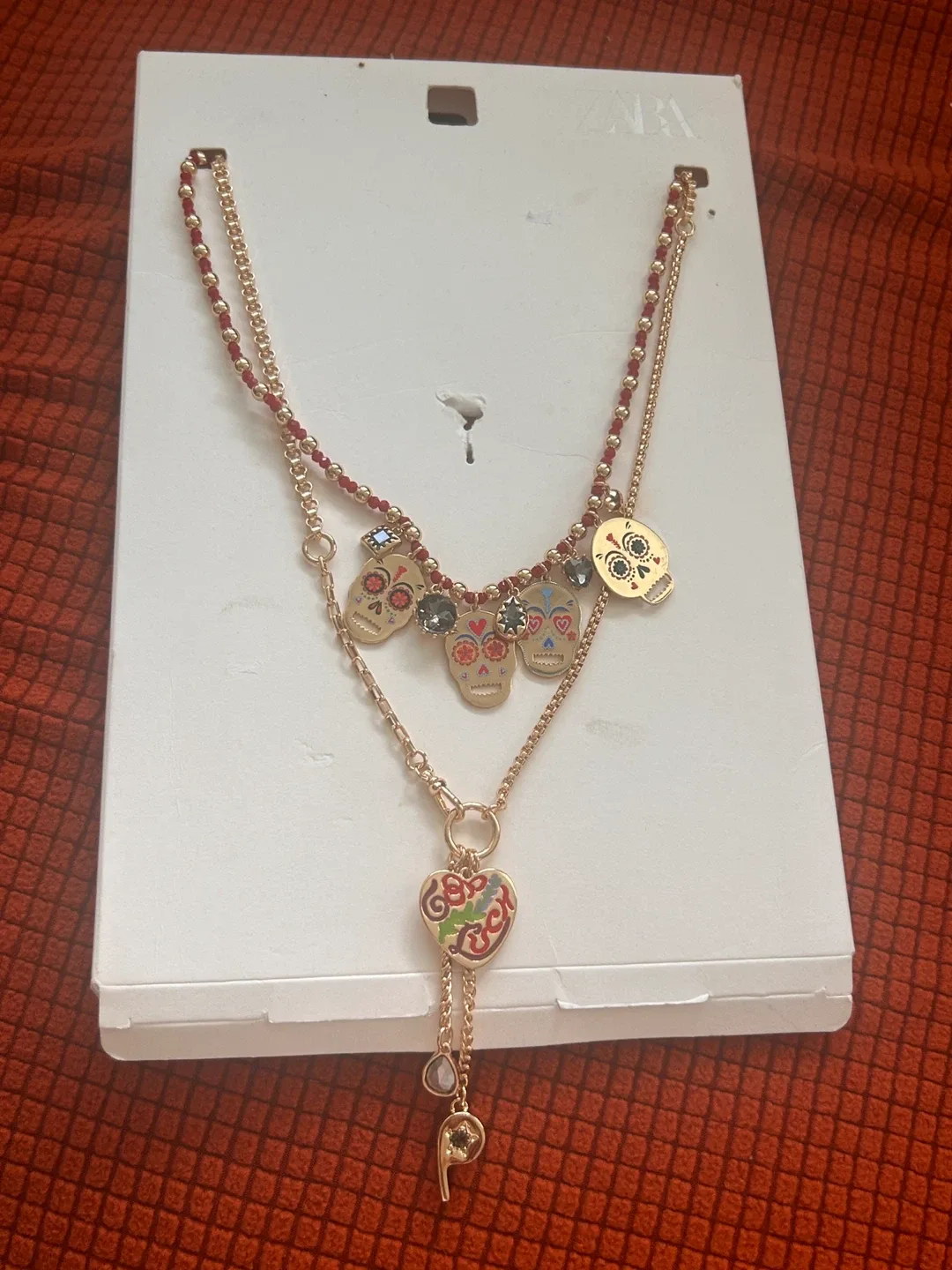 Zara Necklace with Skull and Heart Charms image indicator(6)