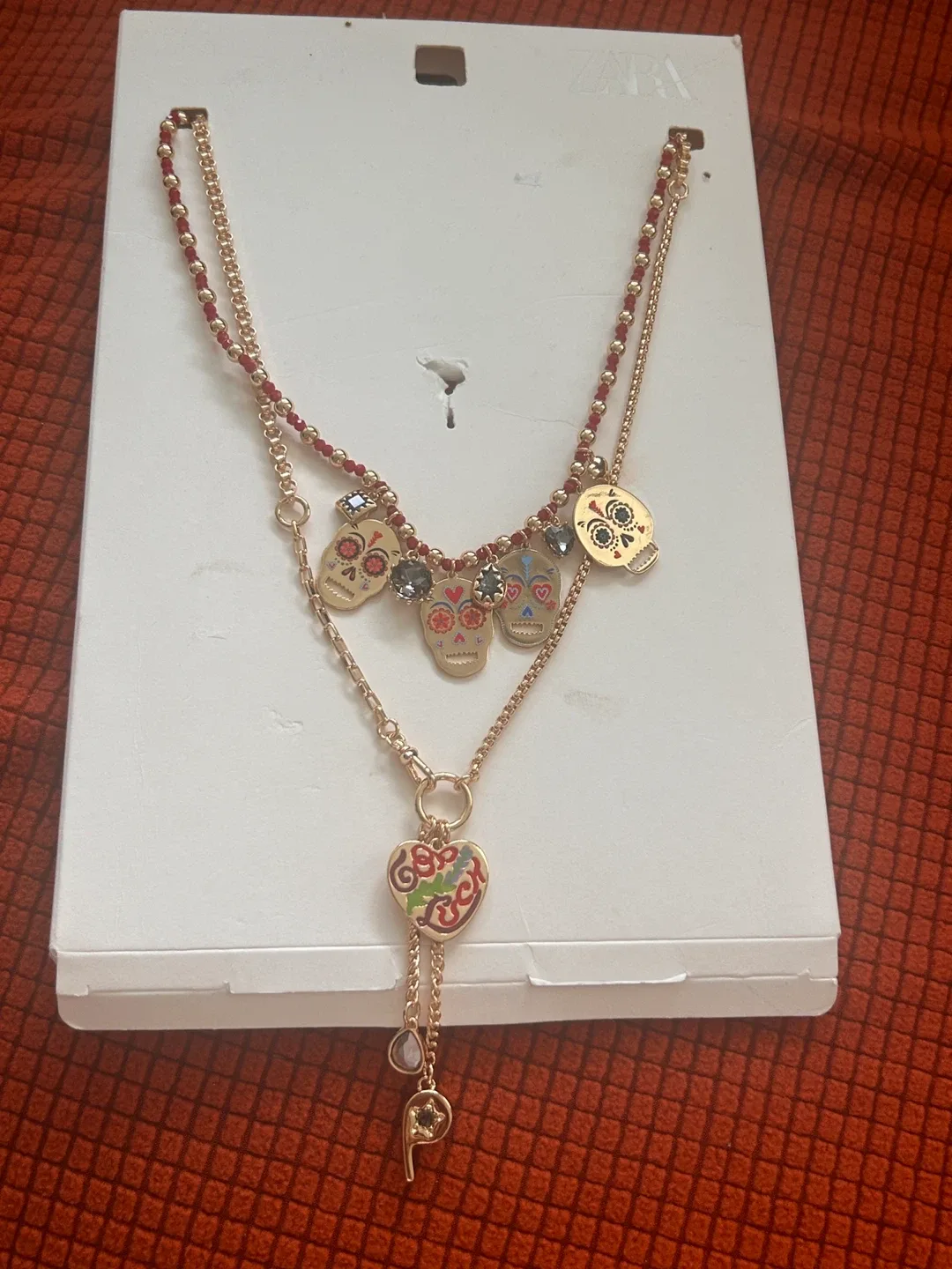 Zara Necklace with Skull and Heart Charms image indicator(8)