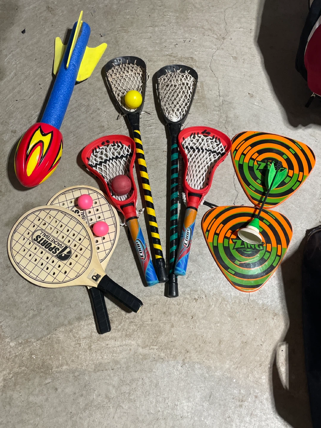 Kids' Sports Equipment Lot: Lacrosse, Rocket, Paddleball, Zing