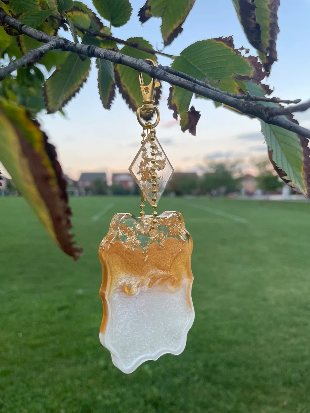 Handmade Resin Keychain - Gold & White image indicator(3)