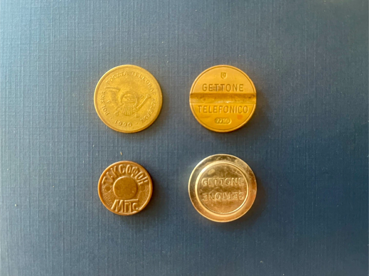 Vintage foreign telephone tokens
