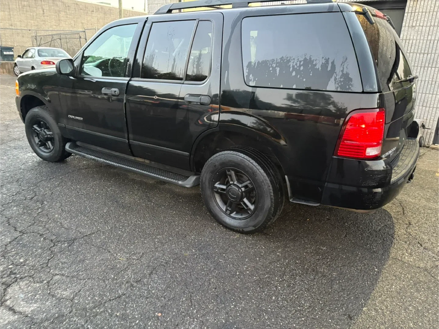 2005 Ford Explorer - Black SUV $2600 image indicator(4)