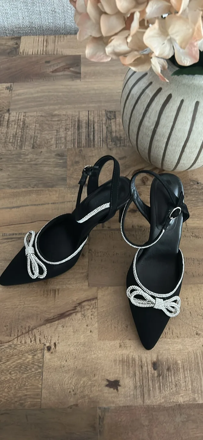Black Heels with Bow image indicator(2)