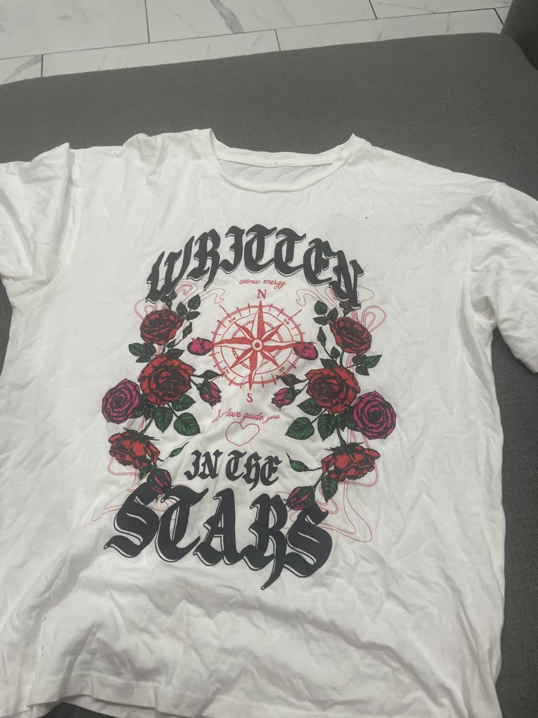 White T-shirt with 'Written in the Stars' Design