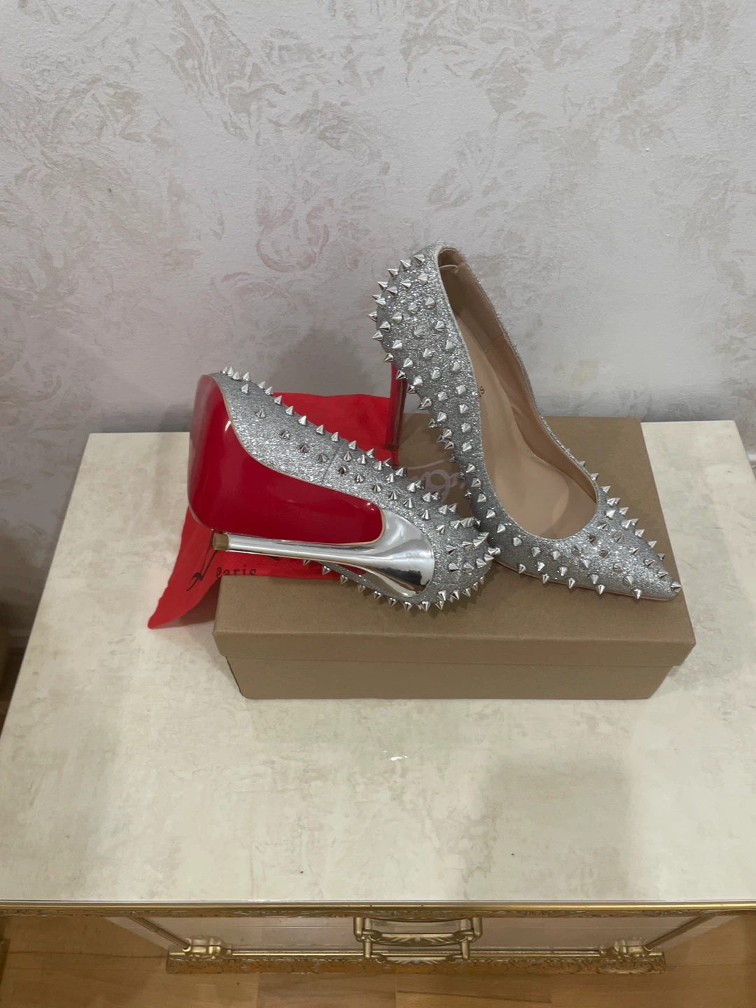 Silver elegant Heels with red sole