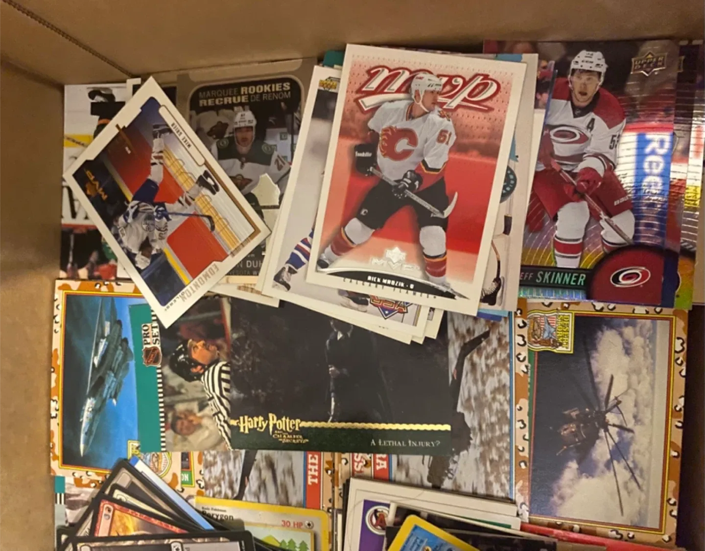 Mixed Lot of Hockey, Pokemon, Magic Cards image indicator(4)