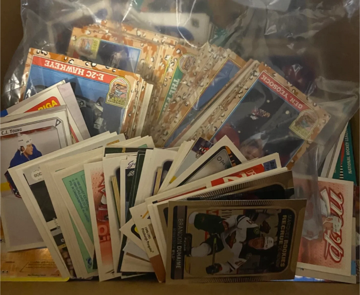 Mixed Lot of Hockey, Pokemon, Magic Cards image indicator(6)