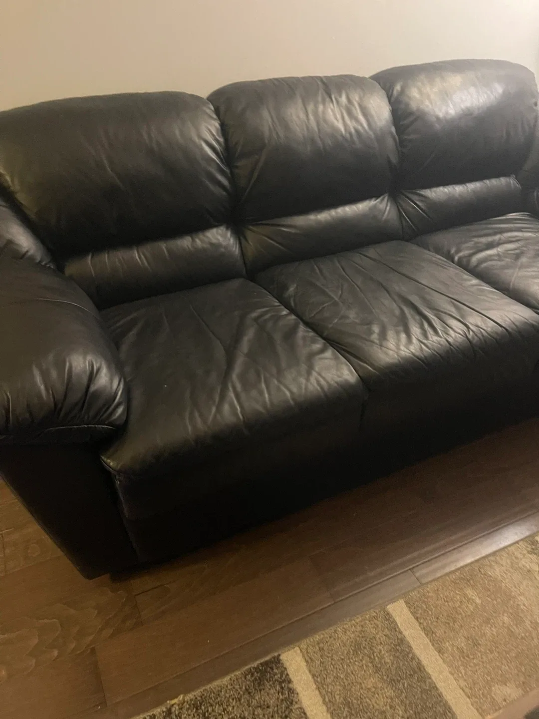 Black Leather Three-Seater Sofa image indicator(3)