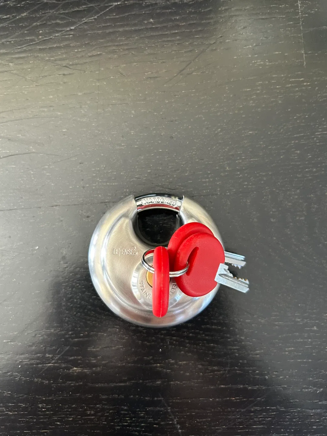 Defender Stainless Steel Disc Padlock with Keys image indicator(4)