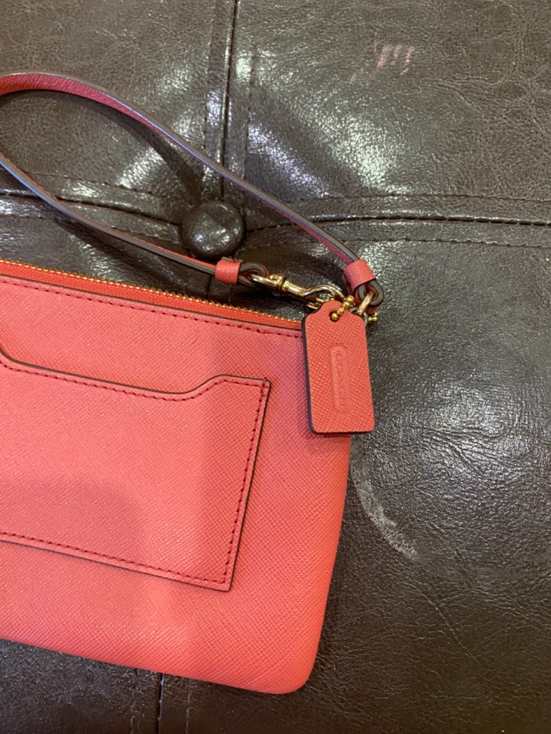 Coach Wristlet Coral Color image indicator(4)