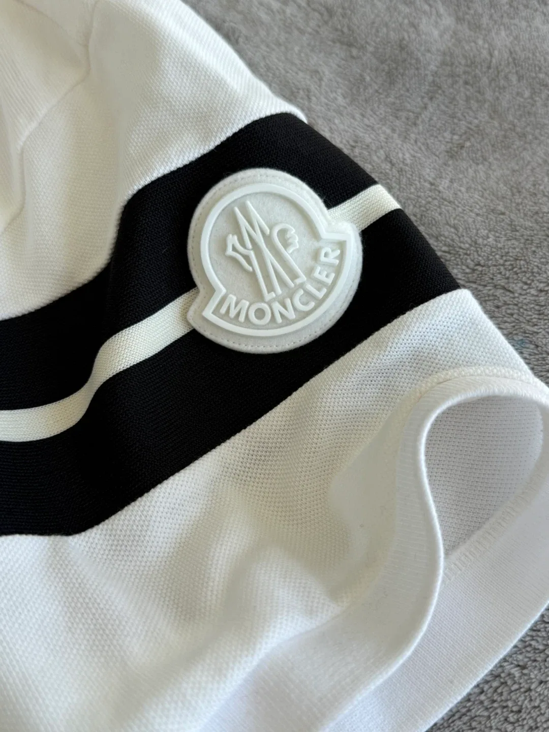 Moncler Stripe-Sleeve Cotton-Piqué Polo Shirt Men image indicator(2)