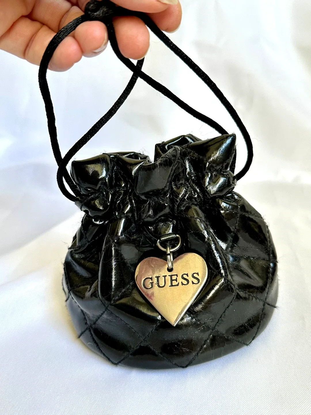 ✨ Guess Black Quilted Drawstring Pouch – Chic & Compact ✨ image indicator(3)