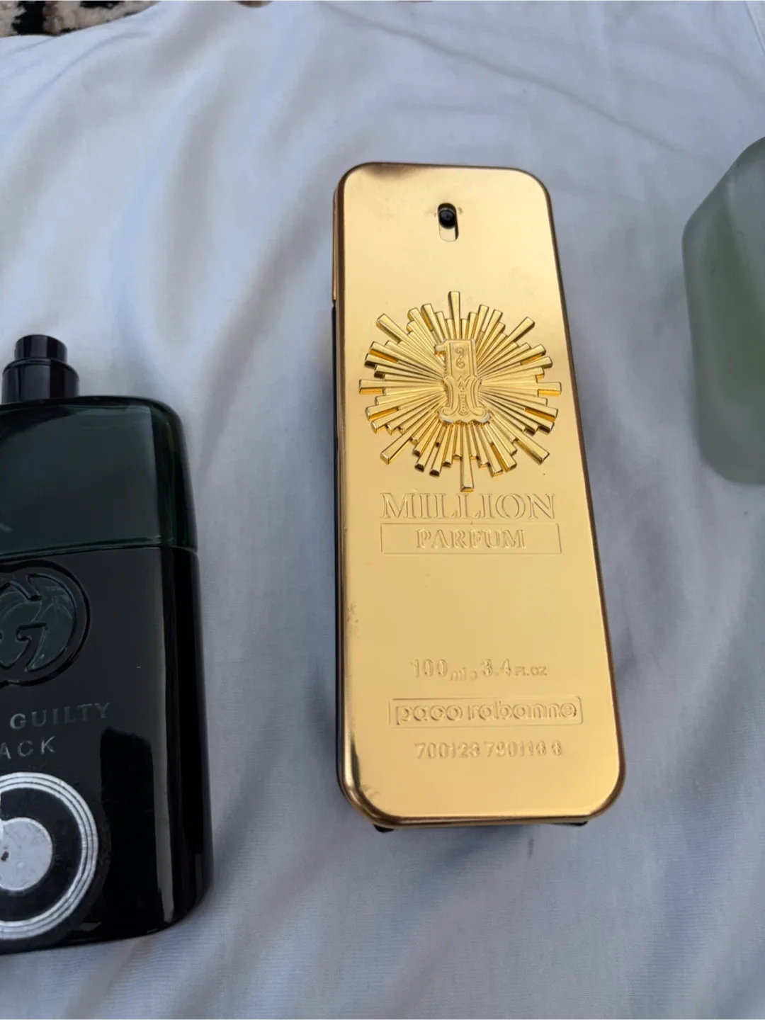 Gucci Guilty Black, Paco Rabanne 1 Million, Armani image indicator(5)