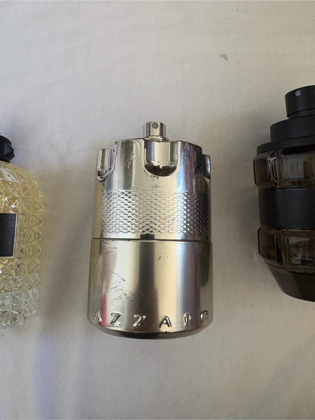 Gucci Guilty Black, Paco Rabanne 1 Million, Armani image indicator(7)