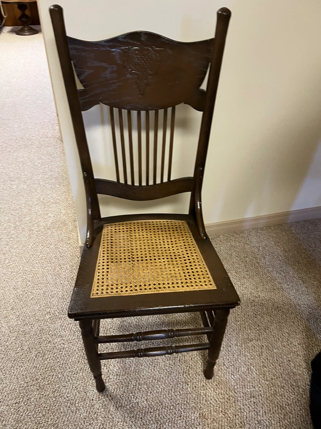 Antique Dark Wood Chair with Woven Seat