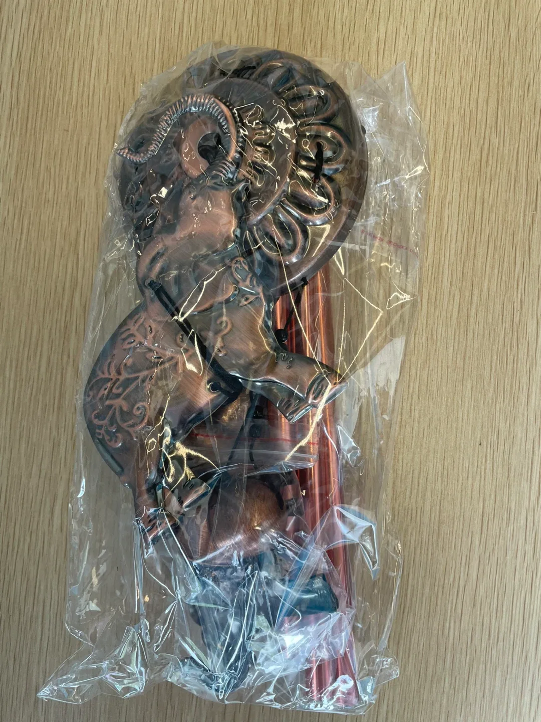 Copper-toned Wind Chime with Animal Charms image indicator(7)