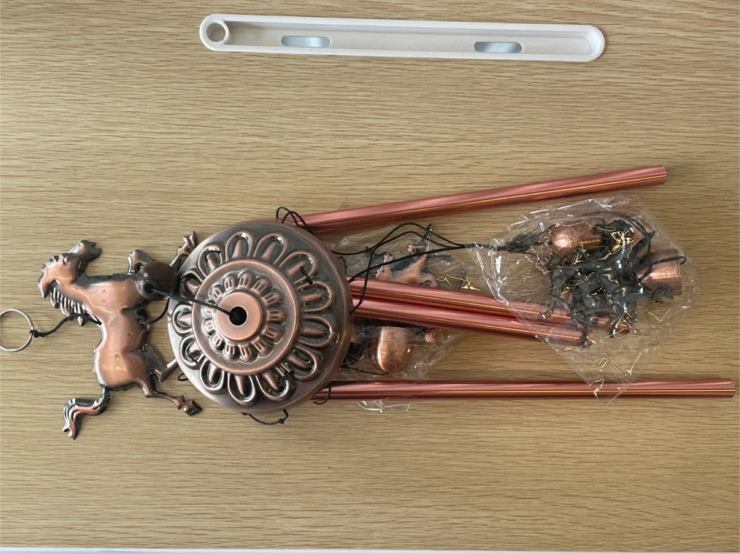 Copper-toned Wind Chime with Animal Charms image indicator(9)