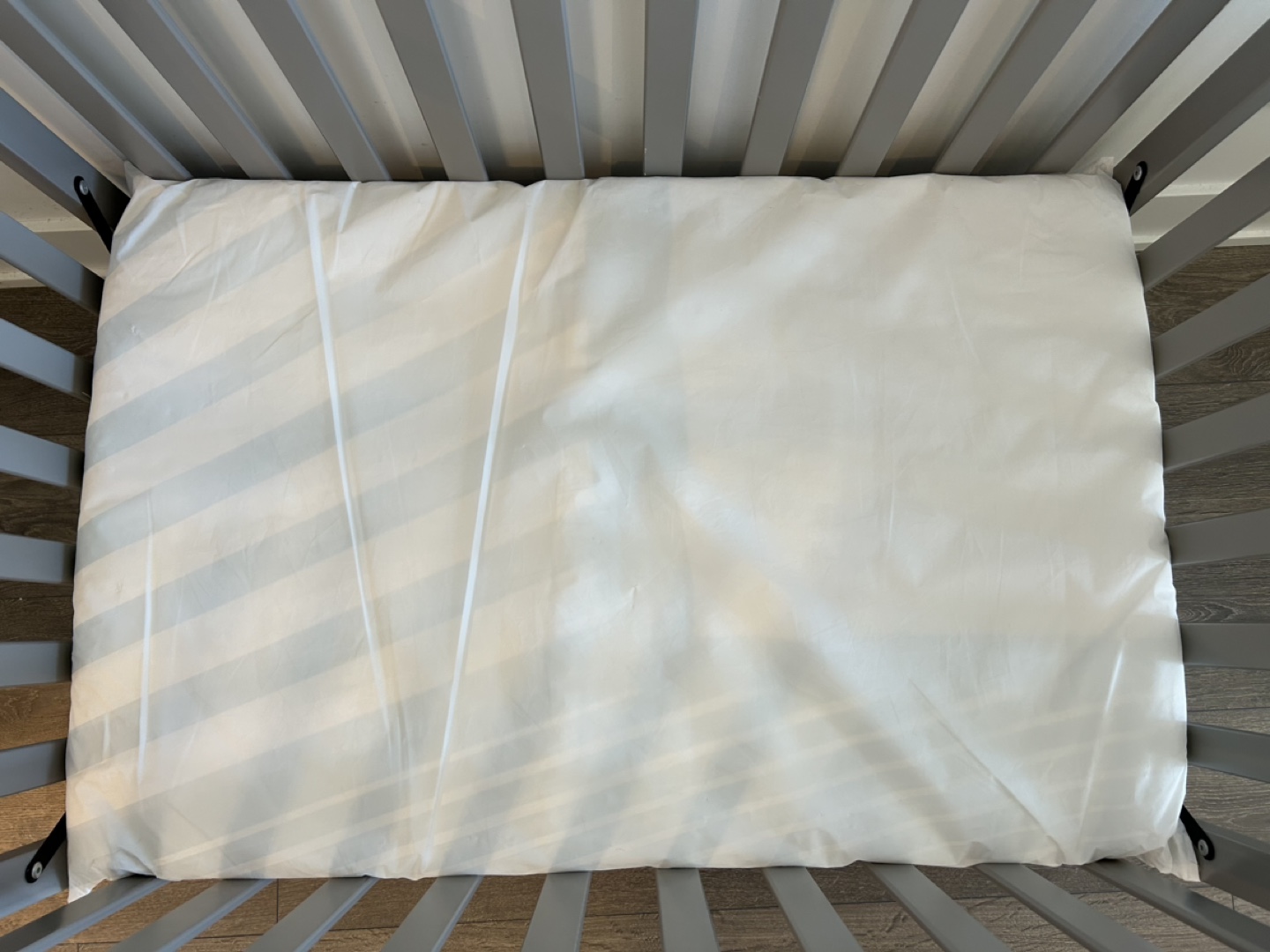 Delta Children Tucker Mini Crib with Mattress and Covers - photo 4