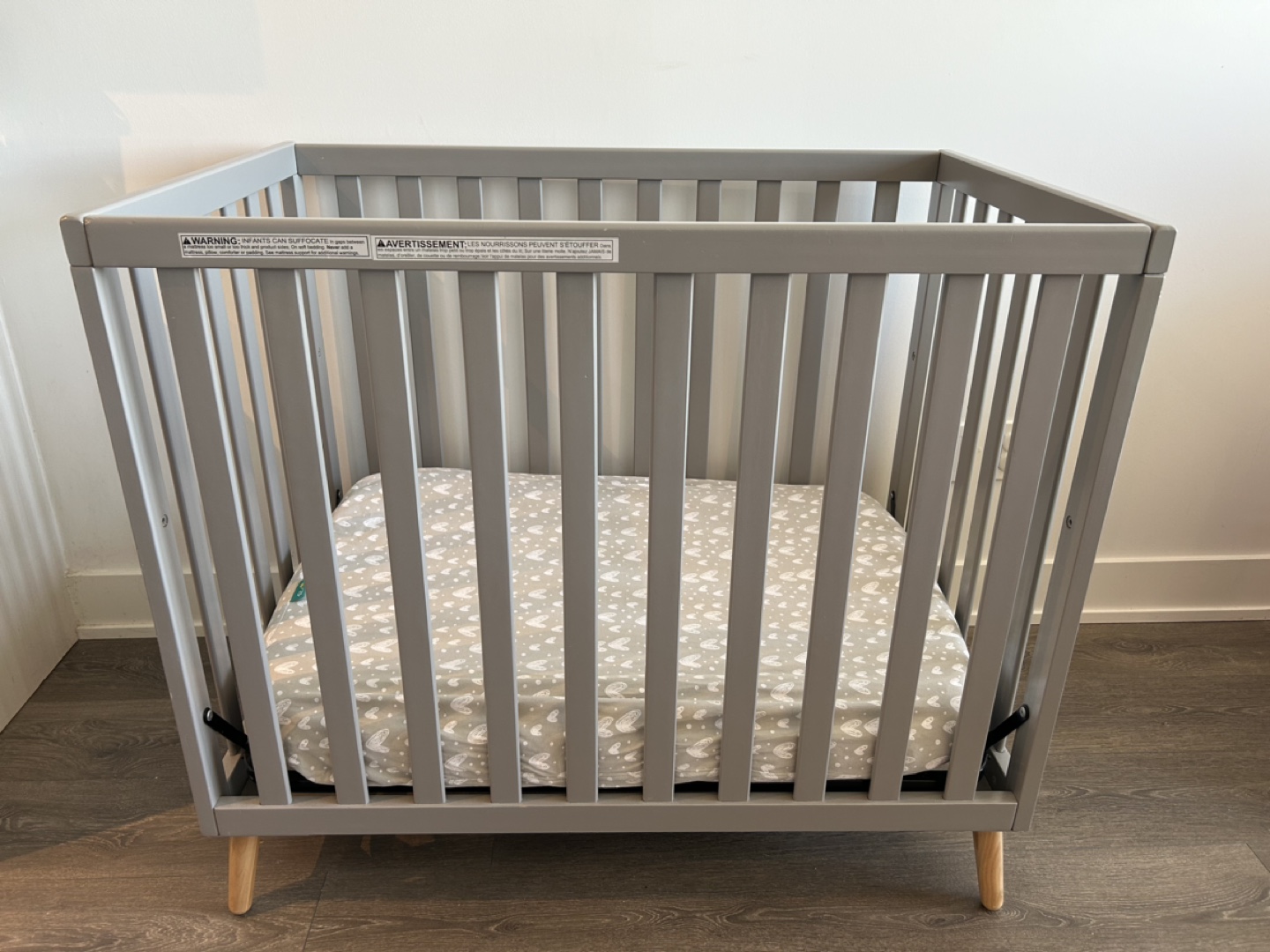 Delta Children Tucker Mini Crib with Mattress and Covers