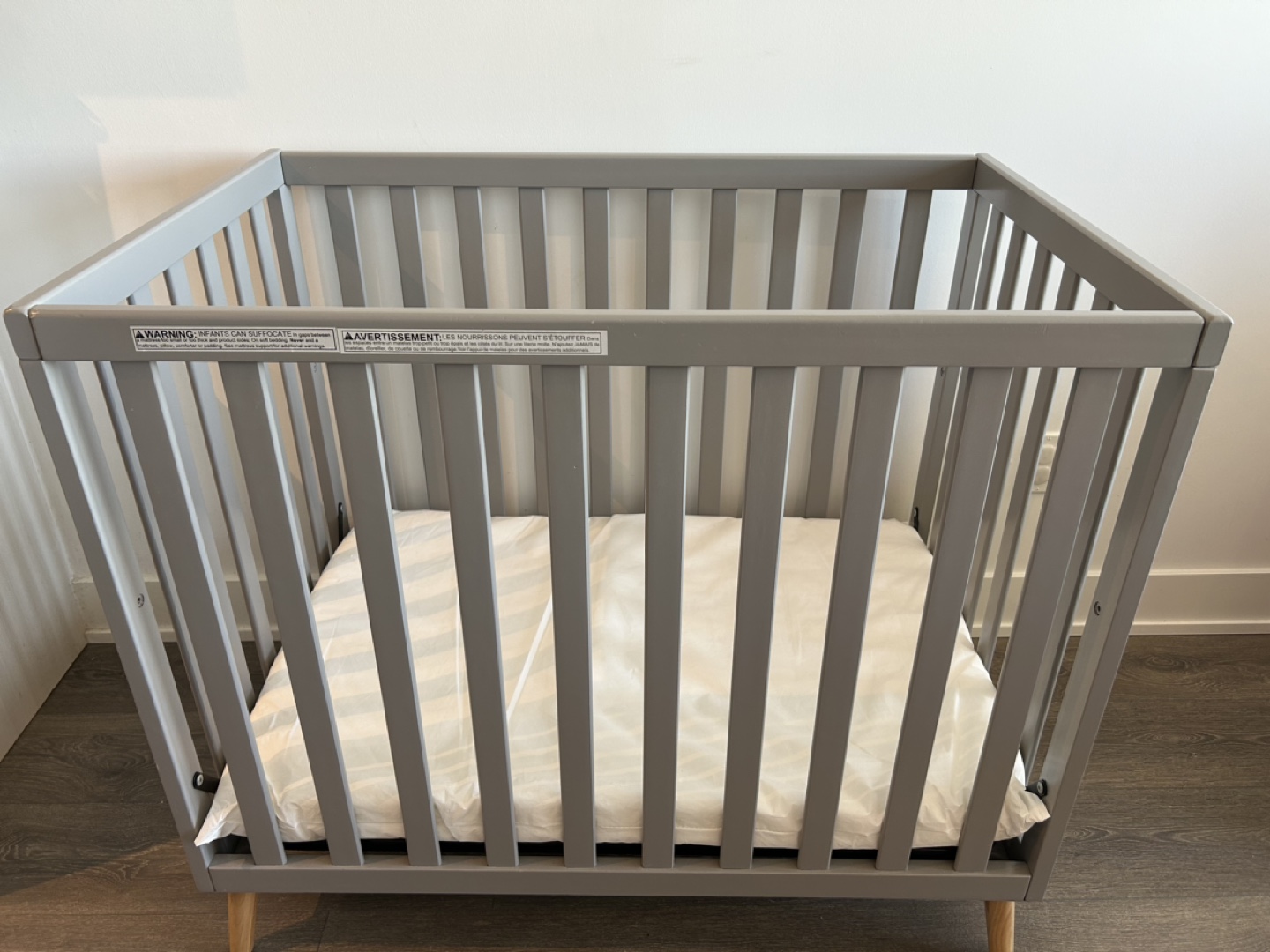 Delta Children Tucker Mini Crib with Mattress and Covers - photo 3