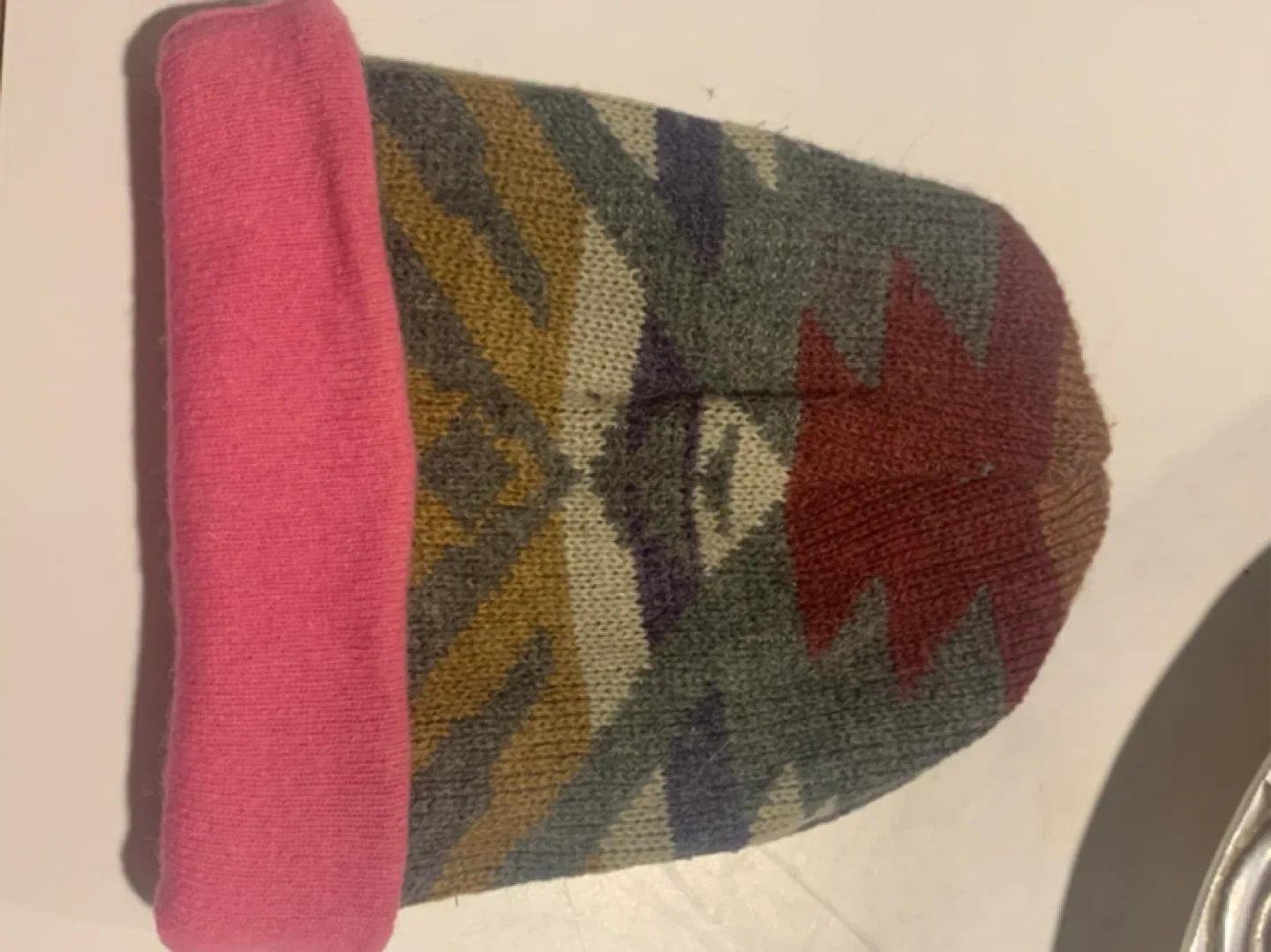 Hat reversible pink/patterned image indicator(2)